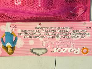 lot 42 image: Roller Derby Girls Adjustable Roller Skates And Razor Knee pads