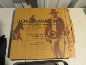 lot 51 image: John Wayne 10.5 Cast Iron Griddle And Camp Tripod
