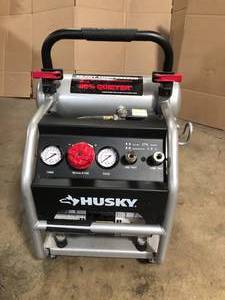 lot 6 image: 4.5 Gal. Portable Electric-Powered Silent Air Compressor by Husky Customer Returns See Pictures