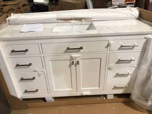 lot 14 image: Jasper 60 in. W x 22 in. D Bath Vanity in Textured White with Engineered Stone Top in Carrara White with White Basins by SUDIO  Customer Returns See Pictures