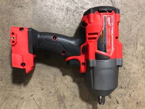 lot 32 image: M18 FUEL 18V Lithium-Ion Brushless Cordless 12 in. Impact Wrench with Friction Ring (Tool-Only) by Milwaukee   Customer Returns See Pictures