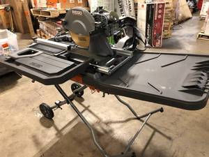 lot 26 image: Ridgid 10 in. Tile Saw  Customer Returns See Pictures