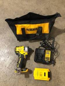 lot 35 image: ATOMIC 20V MAX Cordless Brushless Compact 14 in. Impact Driver Kit by Dewalt  Customer Returns See Pictures