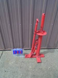 New manual tire changer with dismount tool. As shown.