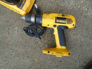 Dewalt 18 volt drill with battery & charger. Used condition. Tested & works. As shown.