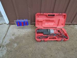 Milwaukee saws all. 120 volt with case. Has new style blade lock. As shown.