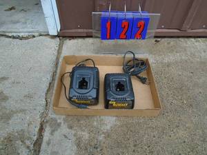 Flat of 2 Dewalt 18 volt chargers. Tested & works. As shown.