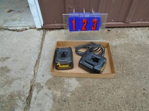 Flat of 2 Dewalt 18 volt chargers. Tested & works. As shown.
