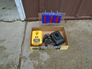 Flat of 2 Dewalt 18 volt chargers. Tested & works. As shown.