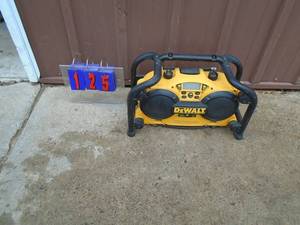 Dewalt 18 volt radio with battery. Has built in charger. Tested & works. As shown.
