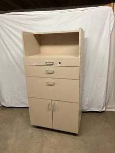 lot 39 image: MSRP $2000 CLINTON INDUSTRIES MOBILE 3 DRAWER 2 DOOR TREATMENT CABINET - I WANT THIS