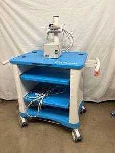 lot 24 image: MSRP $2500 ENSITE SYSTEM DISPLAY CART WITH MONITOR ARM & TWO SLIDE OUT TRAYS PLUS TRIPP LITE BATTERY BACK UP - WORKS GREAT