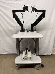 lot 18 image: MSRP $3000 MEDICAL GRADE WORKSTATION CART WITH 2 PIVOTING MONITOR ARMS PLUS Powervar Power Conditioner 5.0 UPS COMPUTER BACK UP SYSTEM & POWER STRIP - GREAT CONDITION POWERVAR GUARANTEED TO WORK I Want This