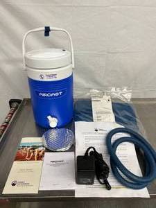 lot 67 image: NEW OPEN BOX DJO AIRCAST CRYOCUFF IC COLD THERAPY COOLER WITH LARGE KNEE CUFF - SOME DUST INSIDE COOLER ETC FROM WAREHOUSE STORAGE OPEN