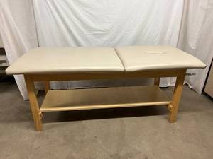 lot 62 image: MSRP $800&nbspTreatment Table with Adjustable Backrest, Contoured Nose Hole, Paper Roll Holder & Full Storage Shelf - Excellent Condition