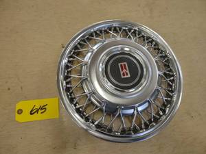 lot 615 image: Oldsmobile Hub Cap, 14...