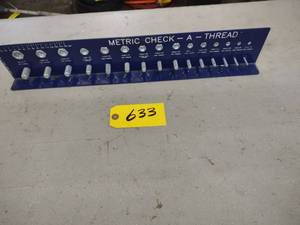 lot 633 image: Metric Check-A-Thread...
