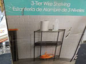lot 11 image: Home Basics wire shelving