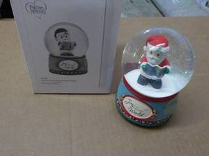 lot 61 image: Precious Moments snow globe