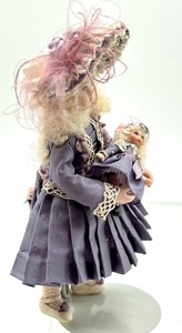 lot 192 image: Miniature Doll with her Dolly