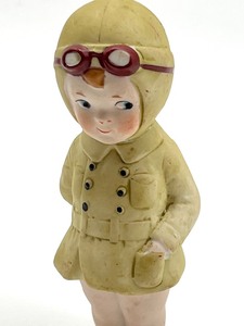 lot 134 image: Vintage 1930s Kewpie Style Bisque Aviator Doll