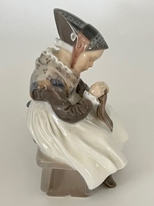 lot 157 image: Vintage Royal Copenhagen Amager Girl Sewing Figurine #1314