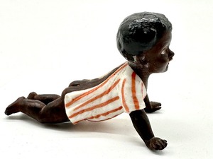 lot 311 image: Miniature Black Americana Porcelain Doll