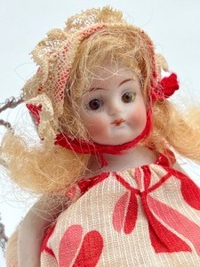 lot 302 image: Antique Miniature Bisque German Doll and Chair