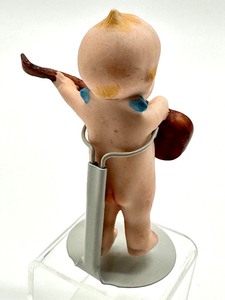 lot 165 image: Antique Kewpie Bisque Doll Playing Guitar