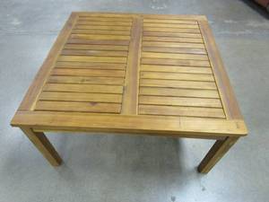 lot 251 image: Christopher Knight Home Perla Outdoor Acacia Wood Coffee Table, Teak Finish (CRACK ON TOP SIDE, OUT OF PACKAGING)