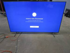 lot 1005 image: 75 Class TU7000 Crystal UHD 4K Smart TV Model UN75TU7000F