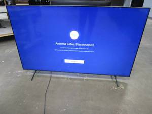 lot 1016 image: Samsung - 65 Class 7 Series LED 4K UHD Smart Tizen TV ModelUN65TU7000FXZA (SCRATCHED BOTTOM CENTER)
