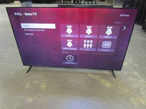 lot 1039 image: TCL - 65 Class 4-Series 4K UHD HDR Smart Roku TV (FAINT BLACK LINE DOWN LEFT CENTER OF SCREEN)