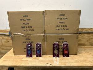 lot 93 image: ADORNE Lot of 4 Cases of Wine Bottle Bijoux (288 total pieces)