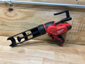 lot 14 image: MILWAUKEE M12 12V Lithium-Ion Cordless 10 oz. Adhesive and Caulk Gun (Tool-Only)