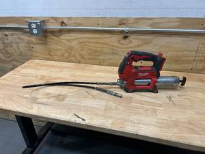 lot 15 image: MILWAUKEE M18 18V Lithium-Ion Cordless Grease Gun 2-Speed (Tool-Only)