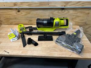 lot 53 image: RYOBI ONE HP 18V Brushless Cordless Pet Stick Vac with Kit with Dual-Roller and Charger