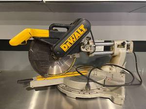 lot 1 image: DEWALT Compound Miter Saw
