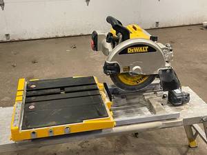 lot 2 image: Dewalt D24000 Tile Saw with water tub and sides.