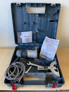 lot 18 image: Bosch Palm Router pr10e in caseLooks like its barely been used.