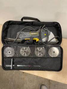 lot 36 image: Performax multi cut saw in case with accessories as seen in photos, accessories appear new.