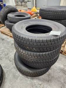 lot 97 image: Lot of (4) Rubbermaster RM77 ST23585R16 Tires
