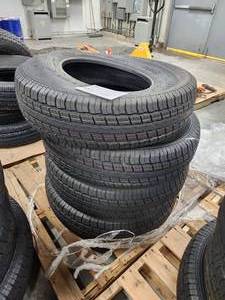 lot 96 image: Lot of (4) Rubbermaster RM77 ST23585R16 Tires
