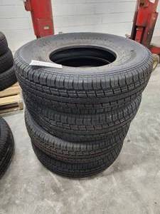 lot 58 image: Lot of (4) Rubbermaster RM77 ST23585R16 Tires