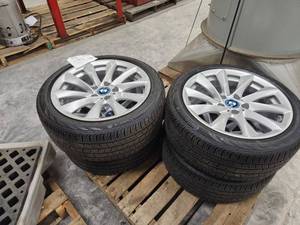 lot 62 image: Lot of (4) Continental 22545R18-95V Tires on BMW 18 Rims