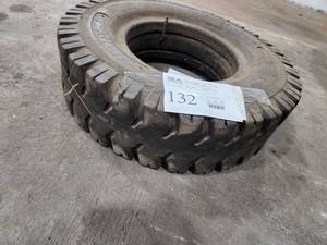 lot 132 image: Lot of (1) Bobcat Ad-Trak IndustrialMining (Not For Highway Use) 700-12 Skid Loader Tire