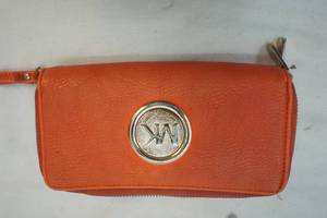 lot 10 image: Michael Kors Clutch