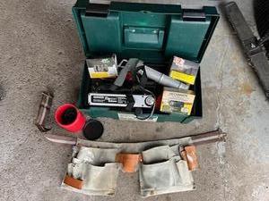 lot 82 image: Tool Lot including tool belt, toolbox, screws, nails, and more