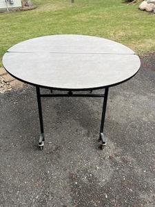 lot 90 image: 48 Heavy Duty Folding Circular Table with Wheels