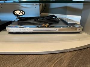 lot 7 image: LG DVDVCDCD Player (Model LGDVB418) with Remote and Cables